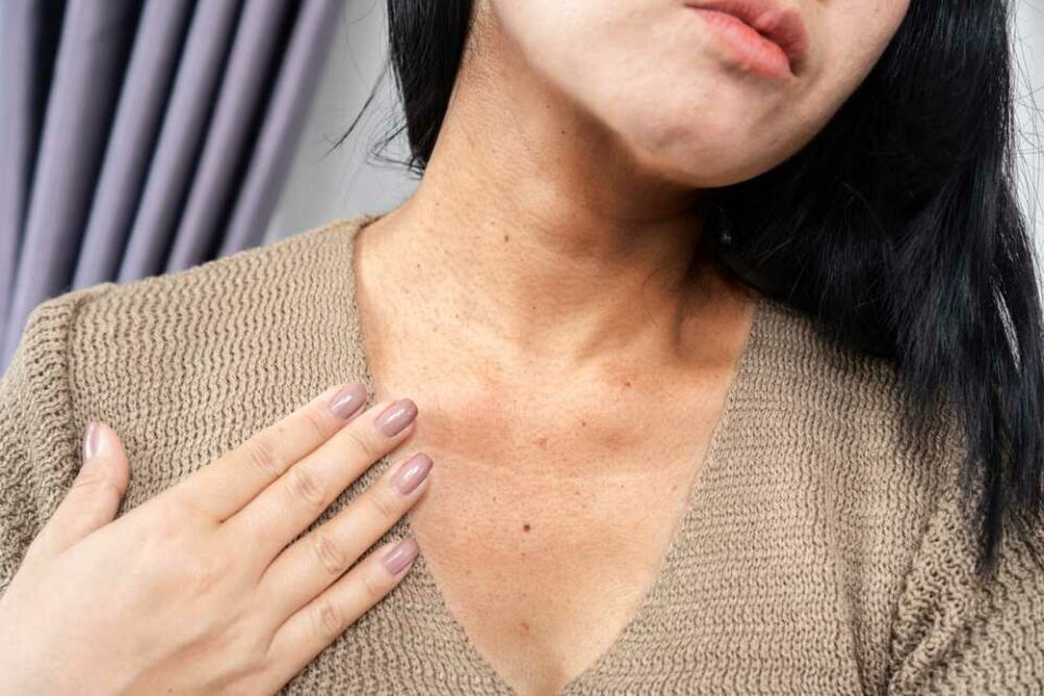 Close-up photo of a woman’s neck displaying signs of aging