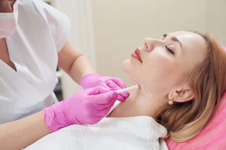 A woman preparing for a neck lift