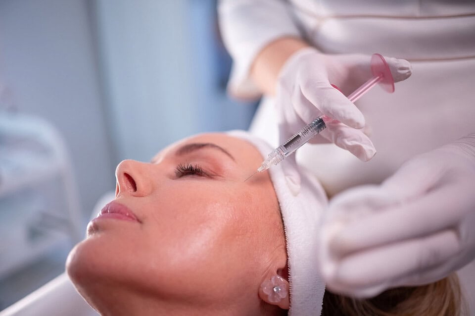 A woman getting skin boosters