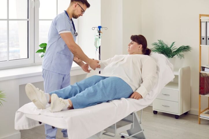 an overweight woman gets an IV drip for help with fat loss